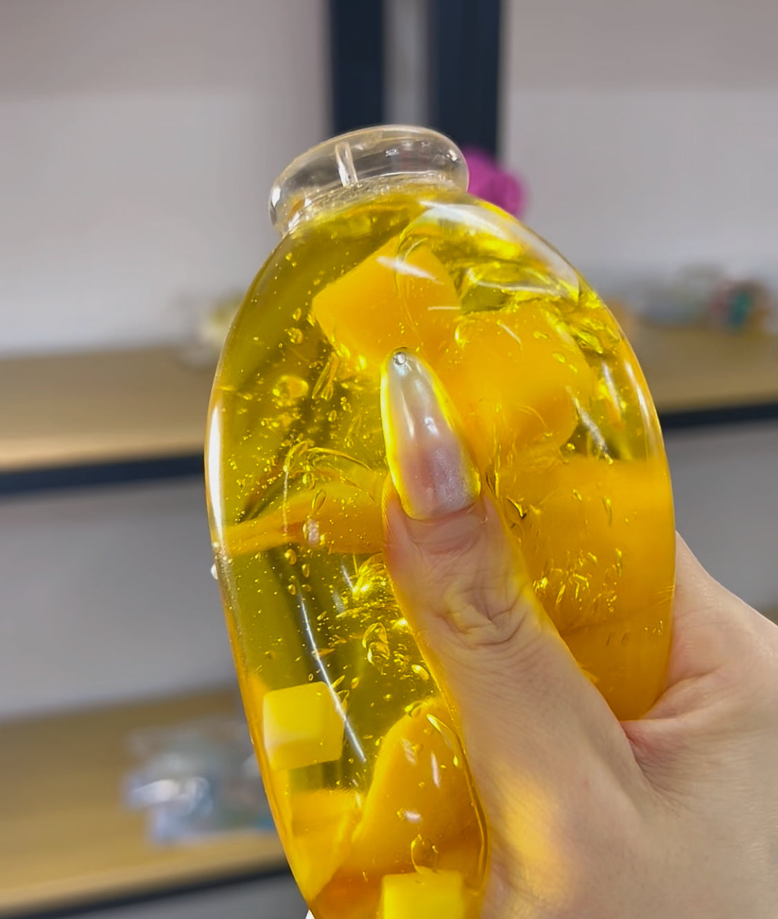 Mango Squishy Bottle Fidget ToyMango Squishy Bottle Fidget Toy