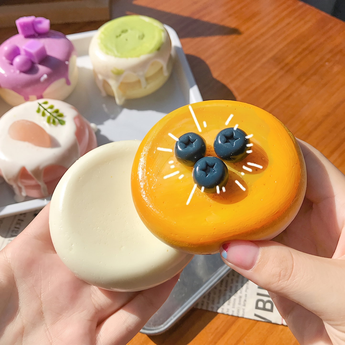 Cute, slow-rise strawberry cake soufflé stress-relief toy; a beautifully crafted, realistic-looking miniature item perfect for dollhouses or as a fun, tactile fidget toy.