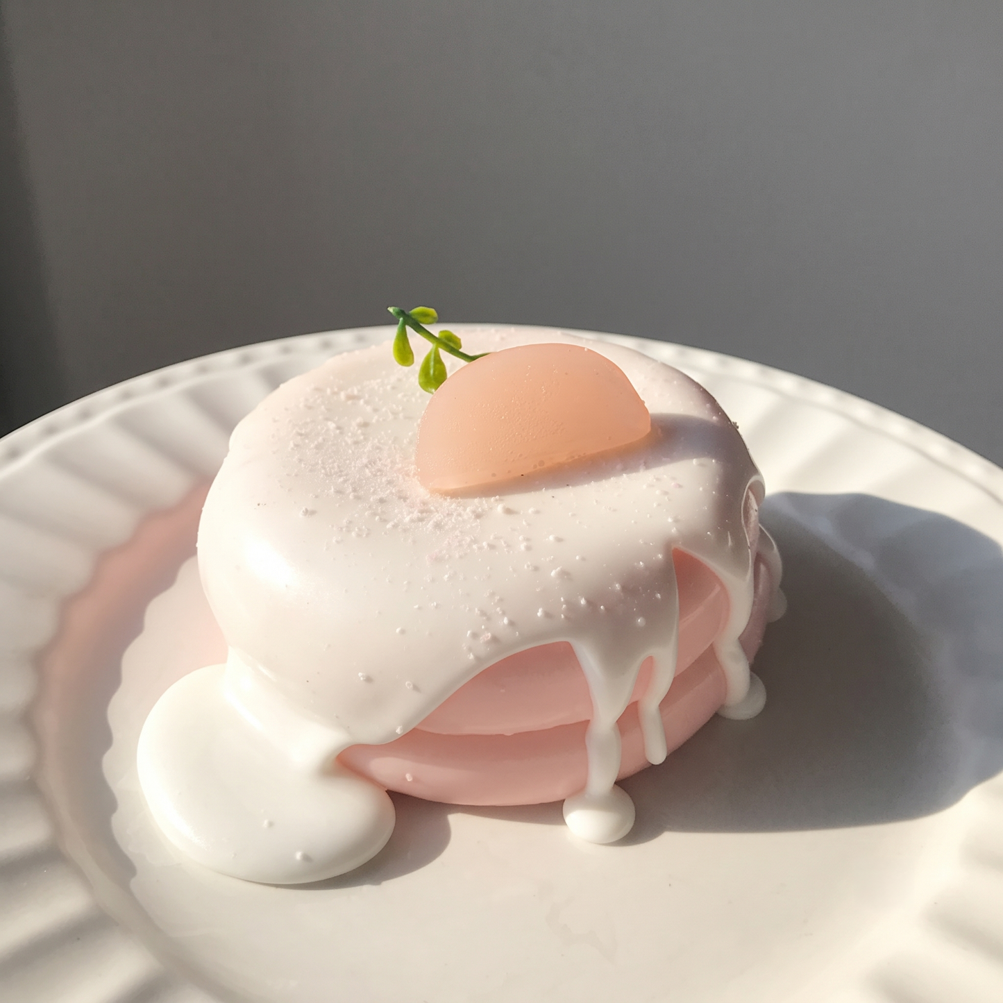 Cute, slow-rise strawberry cake soufflé stress-relief toy; a beautifully crafted, realistic-looking miniature item perfect for dollhouses or as a fun, tactile fidget toy.