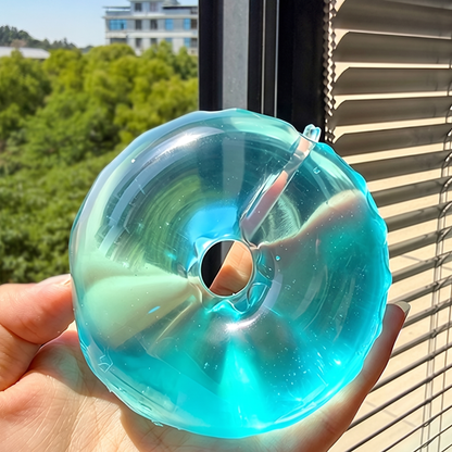 Solid-color maltose-filled donut squeeze toy – moldable, slow-rise, stress-relief, and grip-friendly.