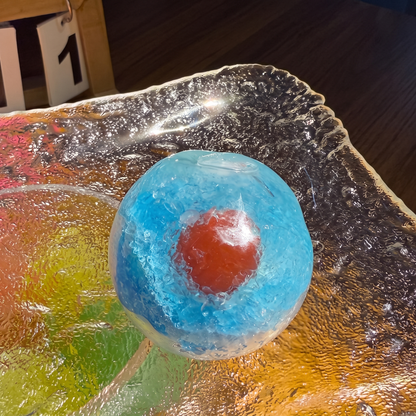 Handmade fruit-themed "crushed ice" stress-relief toy—satisfyingly moldable and non-rebounding