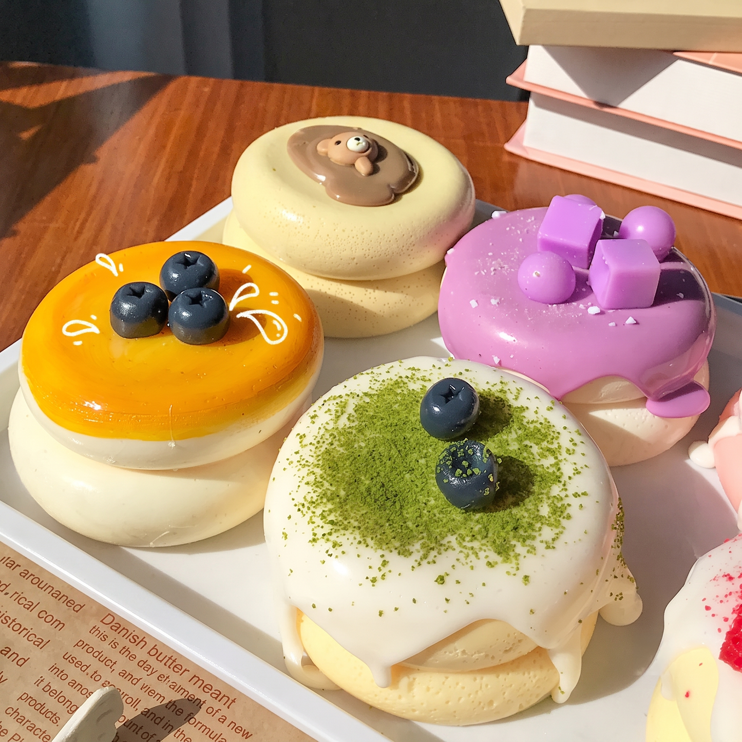 Cute, slow-rise strawberry cake soufflé stress-relief toy; a beautifully crafted, realistic-looking miniature item perfect for dollhouses or as a fun, tactile fidget toy.