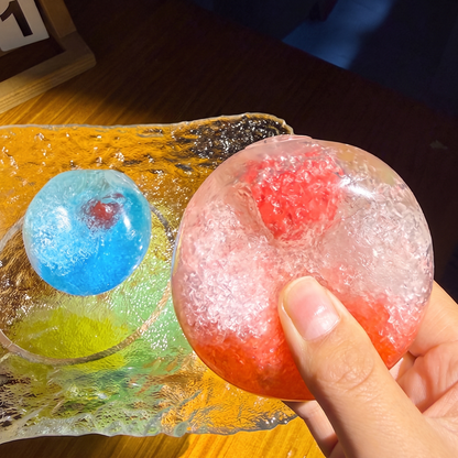 Handmade fruit-themed "crushed ice" stress-relief toy—satisfyingly moldable and non-rebounding
