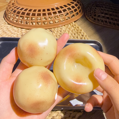 "Vaseline-textured" potato-shaped slow-rise stress relief squeeze toy.