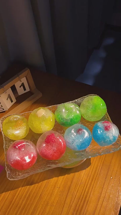 Handmade fruit-themed "crushed ice" stress-relief toy—satisfyingly moldable and non-rebounding